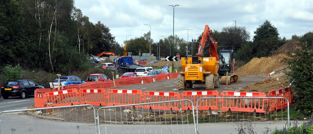 Excavating and traffic jam, Pease Pottage, 20 October 2019